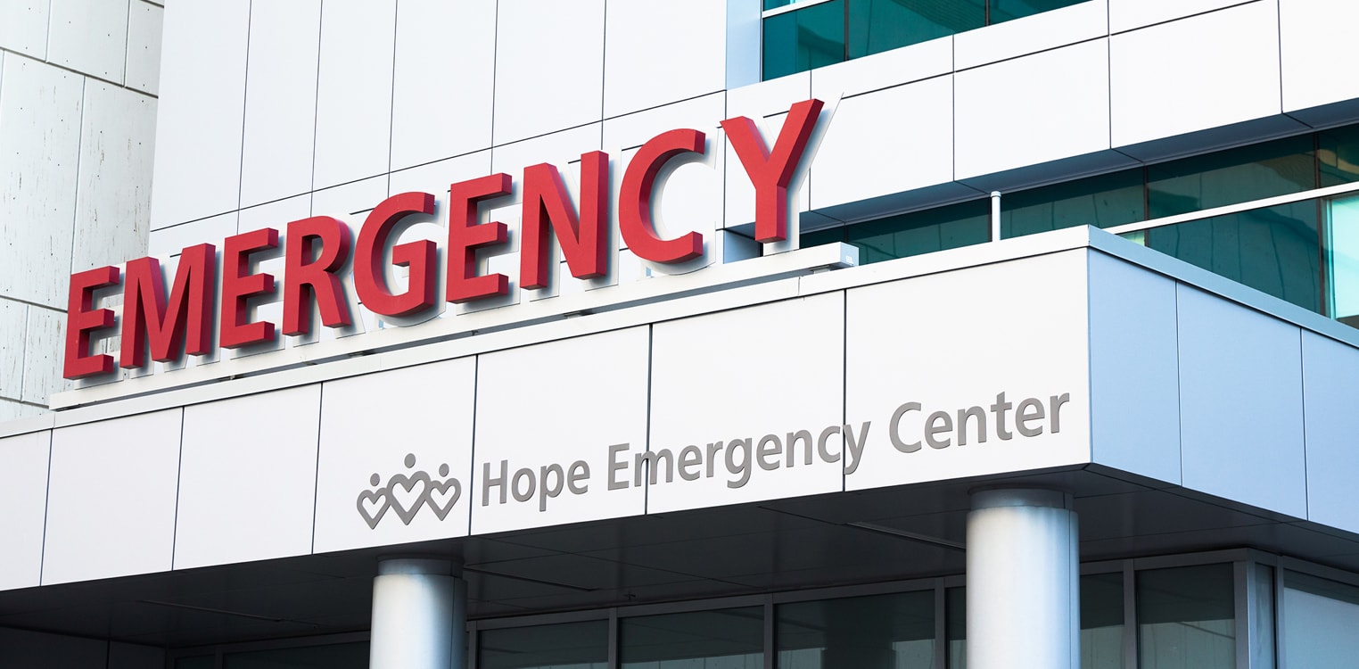 Signage reading "Hope Emergency Center" above the hospital's emergency room entrance