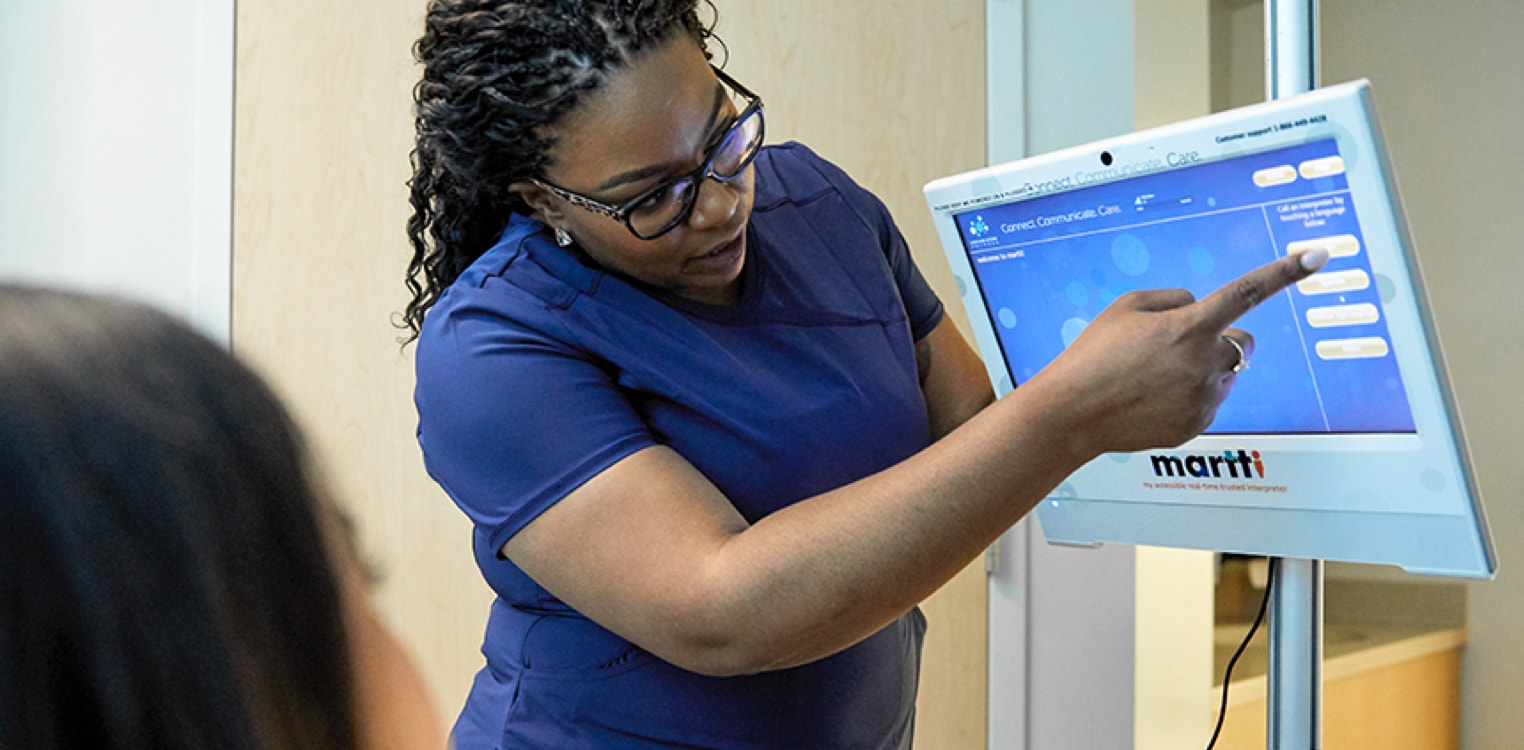 Nurse using a translation device