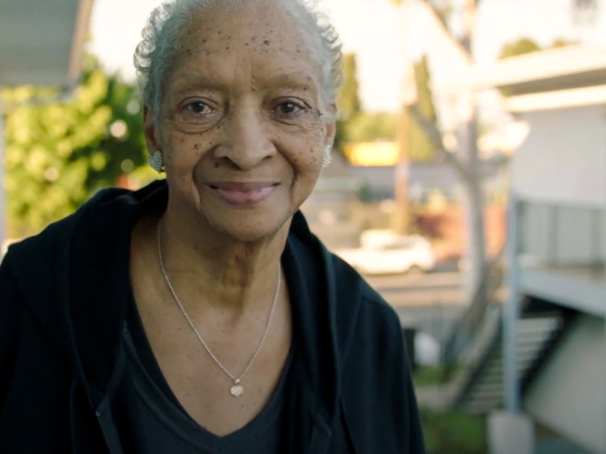 Close up of older Black female patient smiling 