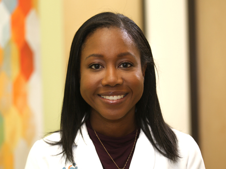 Portrait of Dr. Maita Kuvhenguhwa, a young Black female doctor