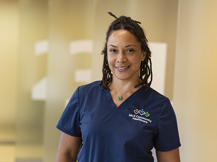 Image of MLKCH Nurse posing in hallway for Career Transitions Fellowship advertising