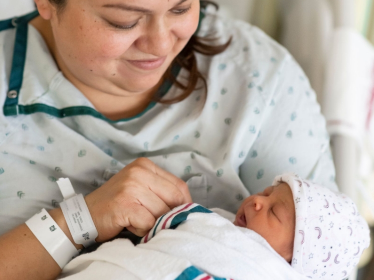 Photo of Hispanic mother and her newborn