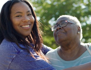 Photo of two women smiling