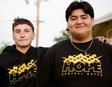 2 Latino young boys smiling