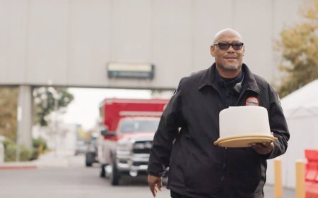 The Dream Show 2026 Photo of Security guard carrying a cake