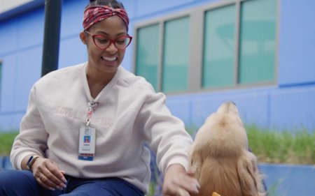 The Dream Show 2026 Photo of woman petting dog