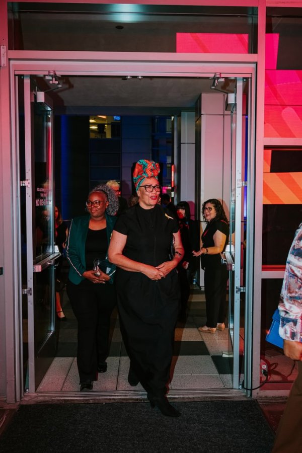 woman entering building