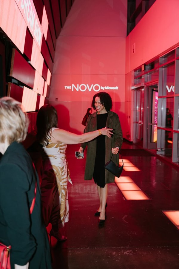 2 women greeting each other