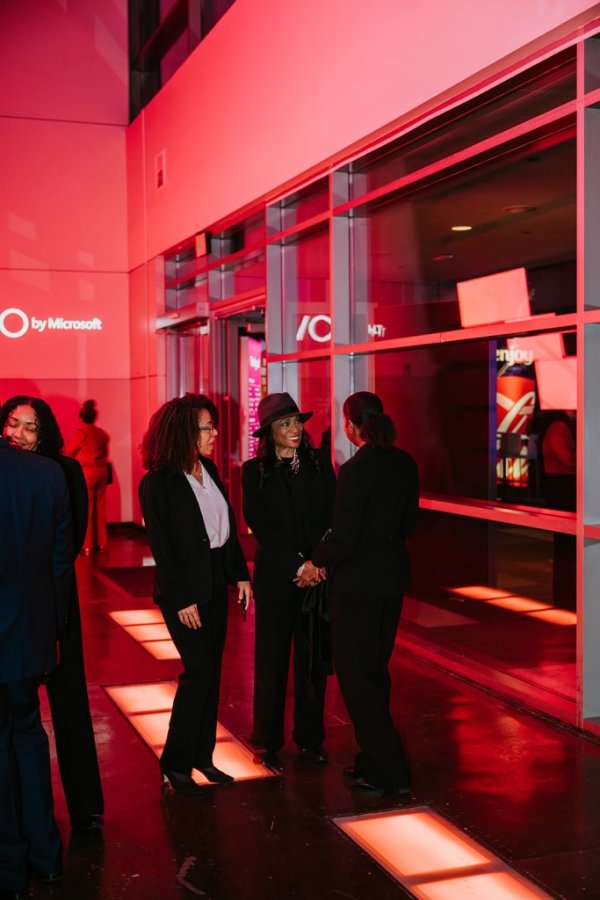 3 women greeting each other