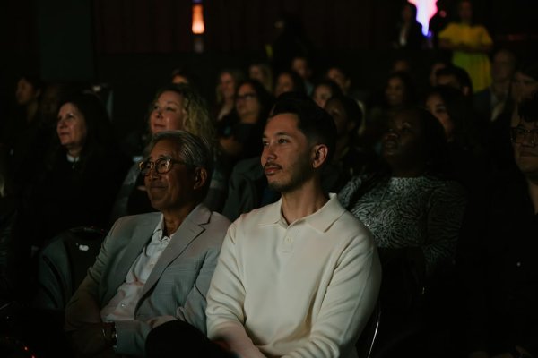 people watching a screen