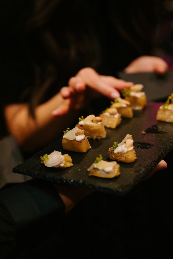 someone grabbing an appetizer