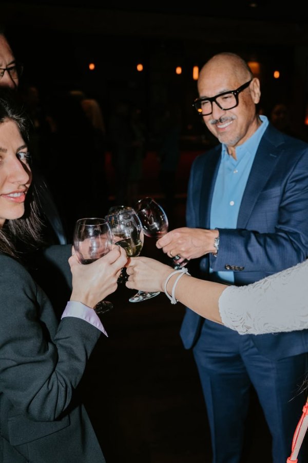 men cheersing glasses