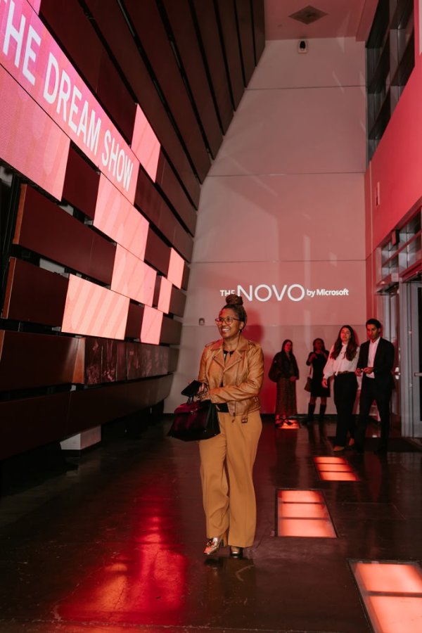 woman walking into lobby