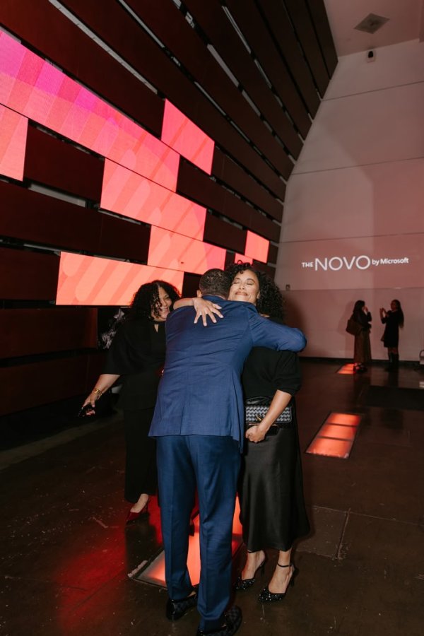 man and woman hugging