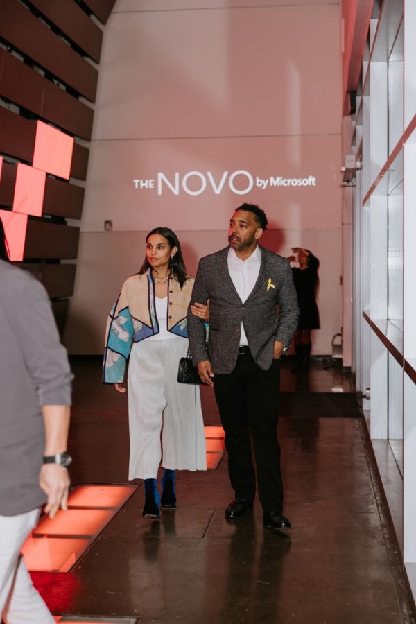 man and woman walking into lobby together