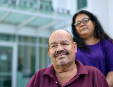 Older latino man and woman outside of MLKCH