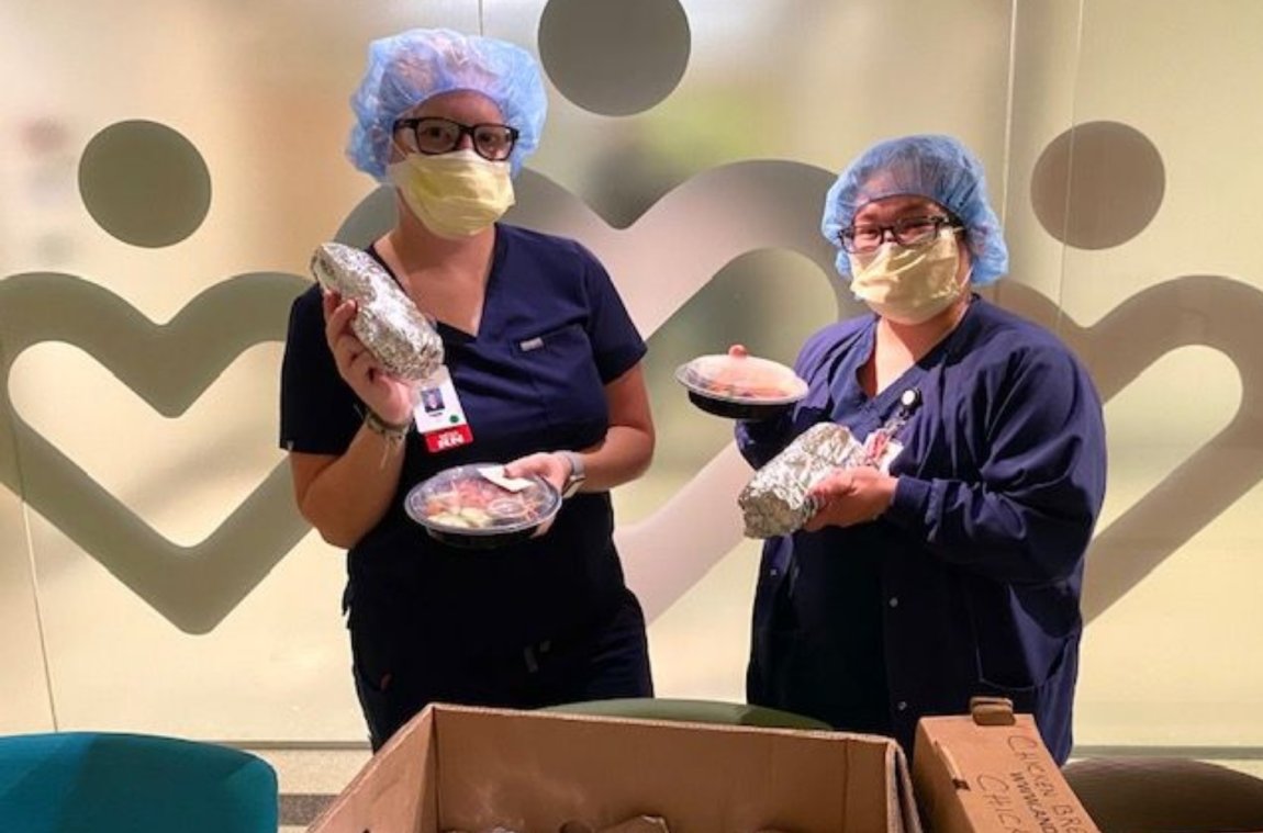 Nurses with donated sandwiches