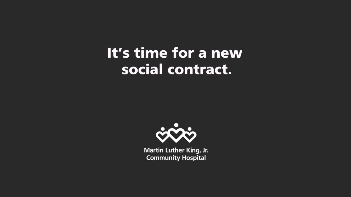 Photo of text that reads "It’s time for a new social contract."