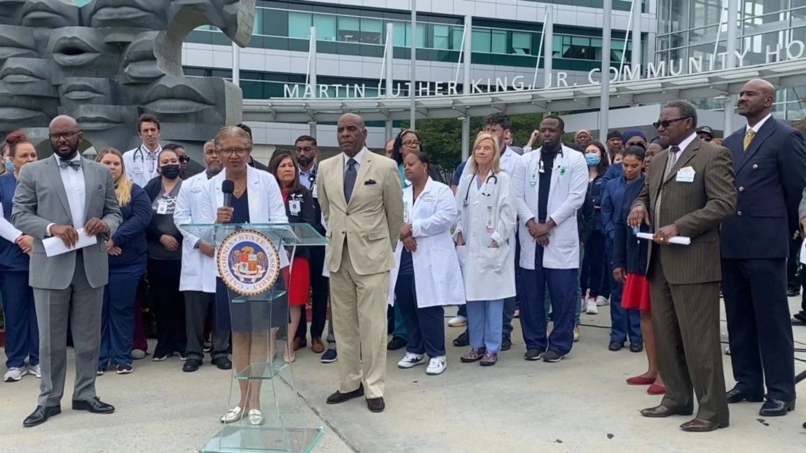 Photo of Dr. Batchlor; Mike Gipson; Steve Bradford and MLKCH staff at a June 6, 2024 press conference