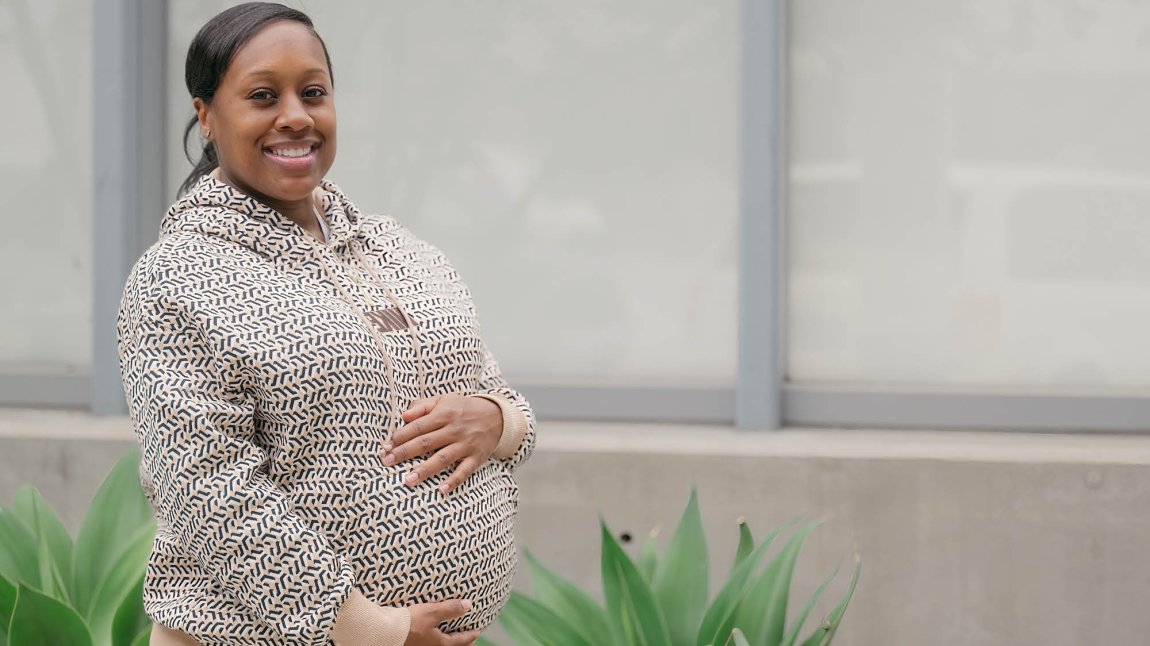 Pregnant woman smiling