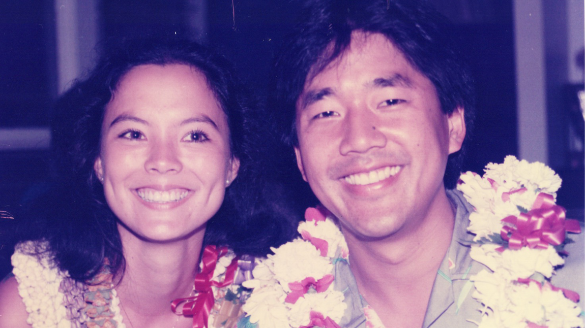 Asian man and woman smiling 
