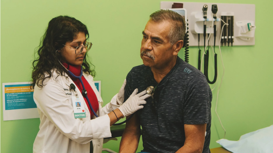 Doctor treating a patient