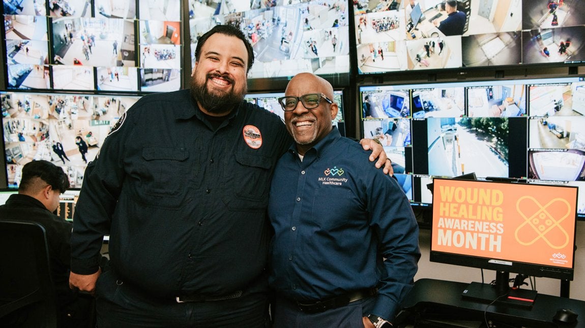 Portrait of MLKCH staff members Franky Barrera and Robert Scott