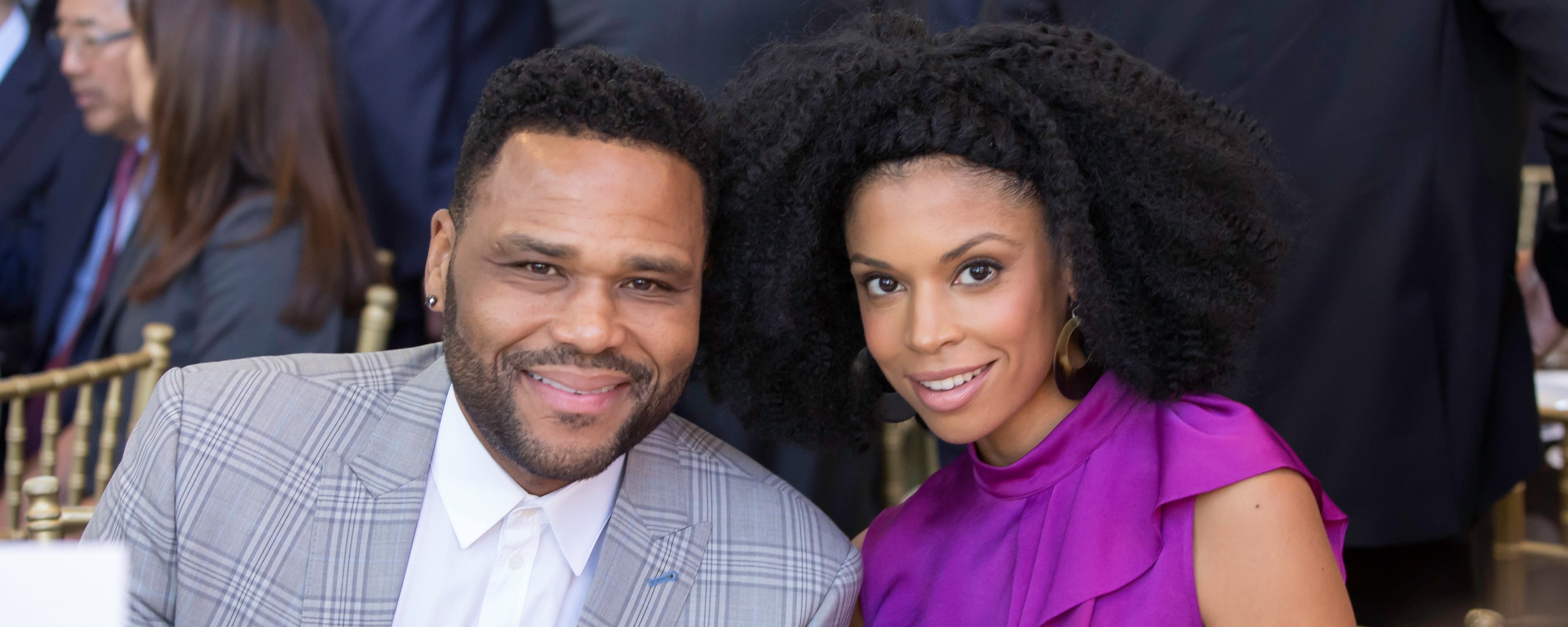 Anthony Anderson, a middle-aged Black man, seated next to Susan Kelechi Watson, a middle-aged Black woman
