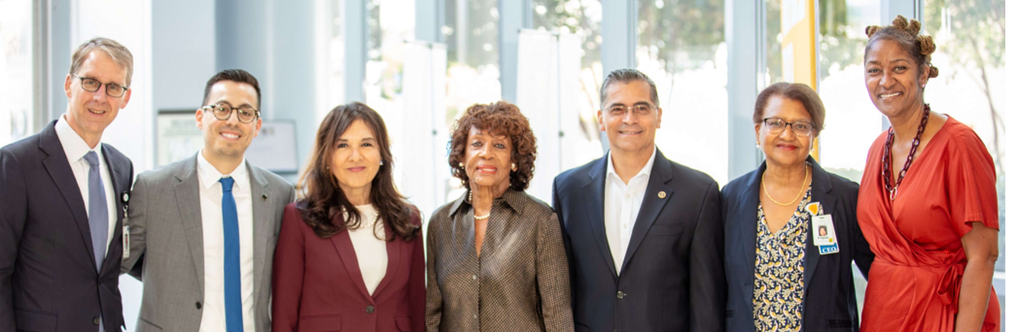 Group photo of Sec. Becerra, elected officials and MLKCH leaders