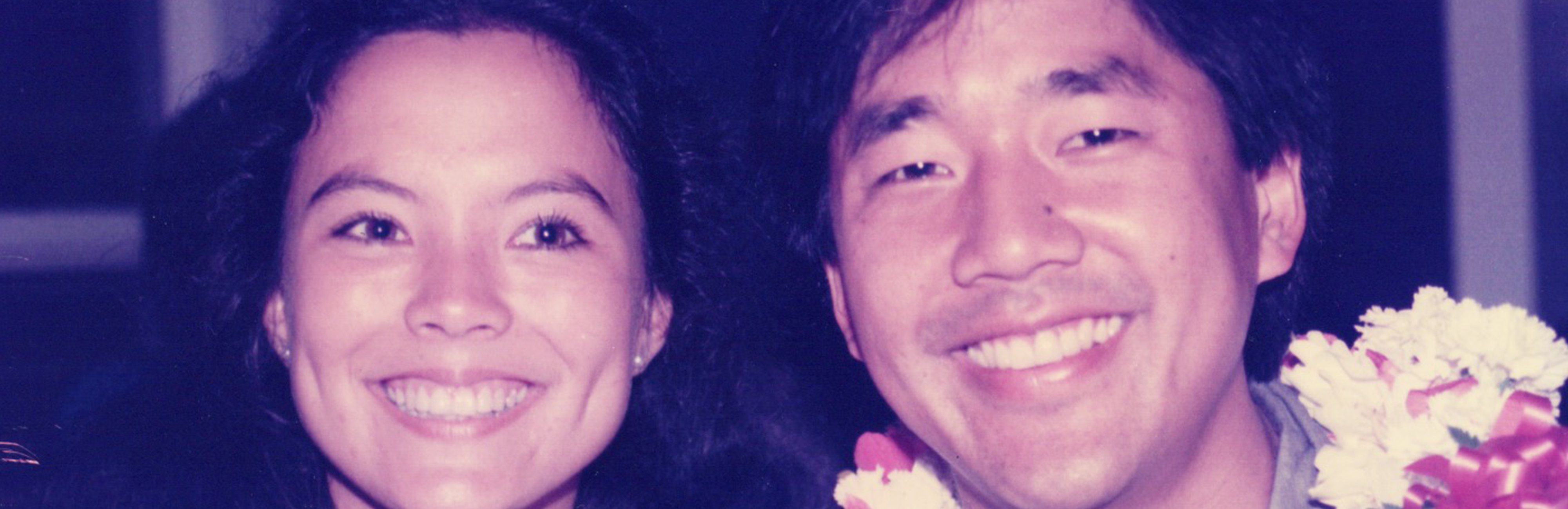 Asian man and woman smiling 