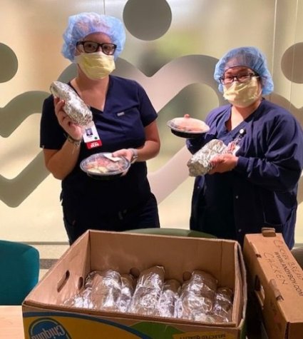 Nurses with donated sandwiches