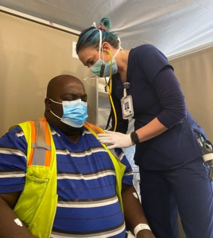 Nurse and patient in masks