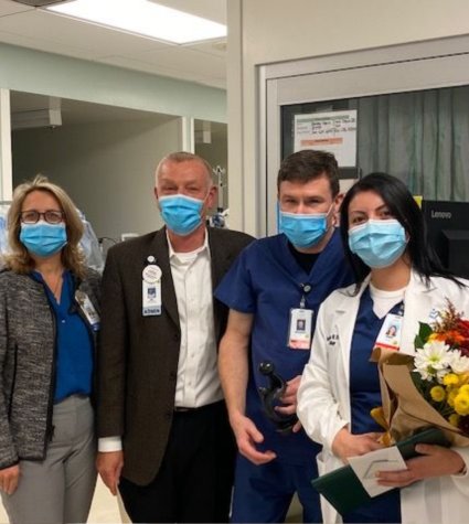 Photo of nurse and staff with Daisy awards