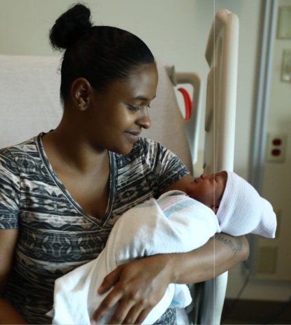 Mother with newborn child