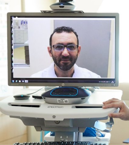 Photo of a physician on a screen