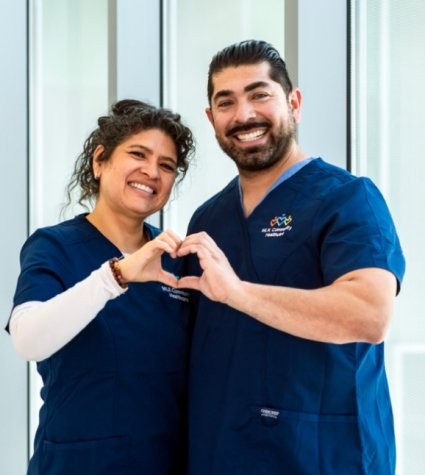 Photo of Hispanic female and male healthcare workers