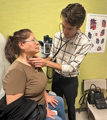 Doctor tending to patient