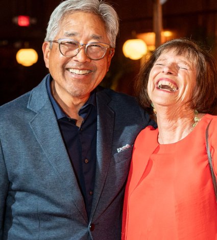 John Kobara and Dyan Sublett sharing a laugh at the MLK Community Health Foundation Inspiration Dinner 2025