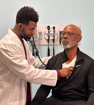 Patient being checked on by doctor