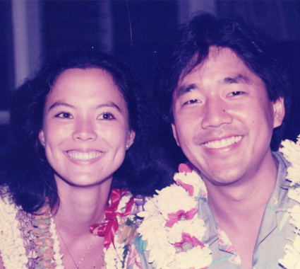 Asian man and woman smiling 
