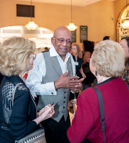 Evening of Inspiration 2026 attendees having a conversation