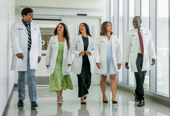 MLKCH residents walking down the hall.