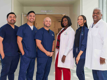 MLKCH nurses smiling for group photo.