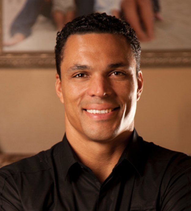 Heashot of Tony Gonzalez, a young Black man