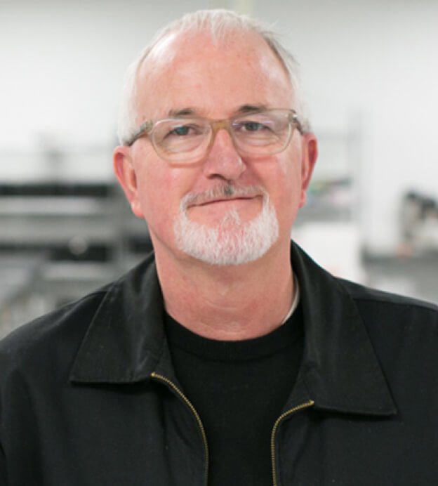 Headshot of Robert Egger, a middle-aged white man with glasses