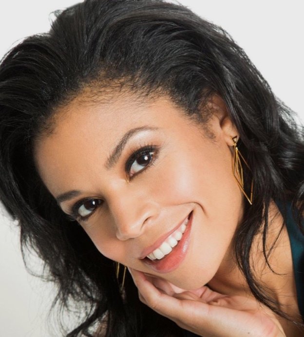 Headshot of Susan Kelechi Watson, a light-skinned Black woman