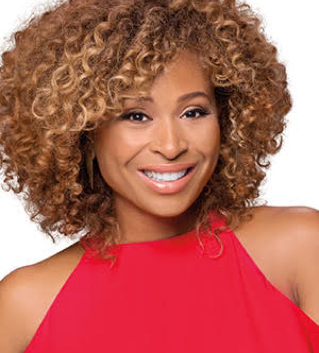 Headshot of Tanika Ray, a young Black woman with curly hair