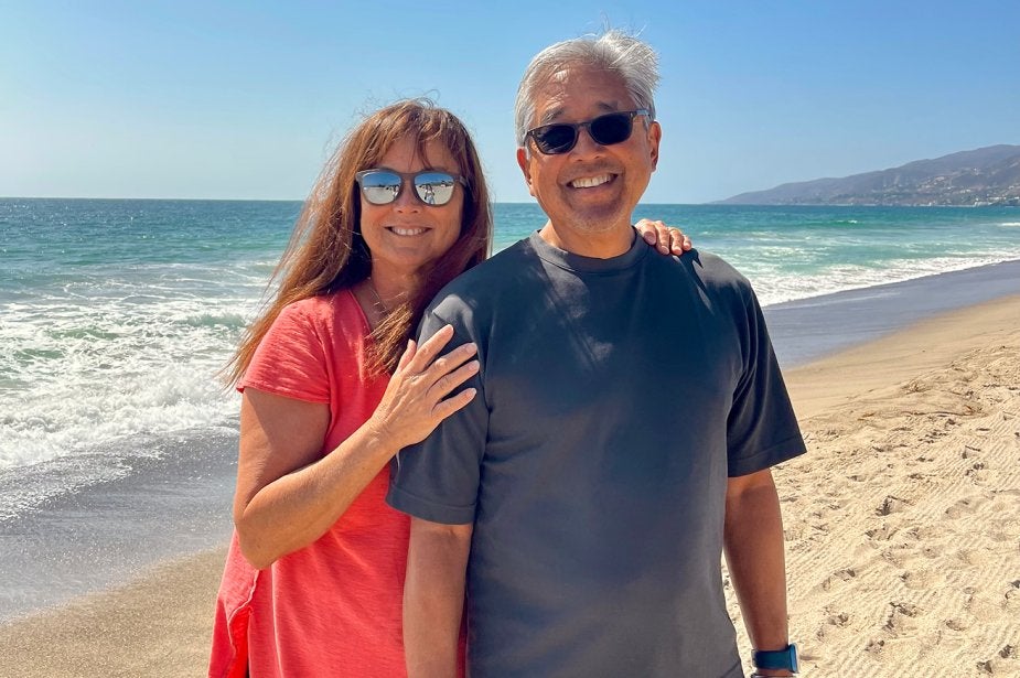 Planned Giving donors John Kobara and wife Sarah at the beach in Southern California