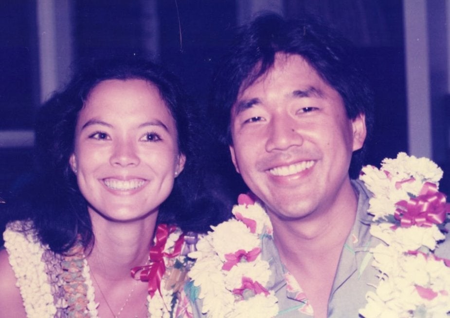 Sara and John Kobara historical photo smiling on vacation