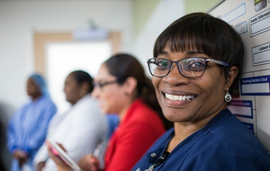 Nurse sitting in a meeting
